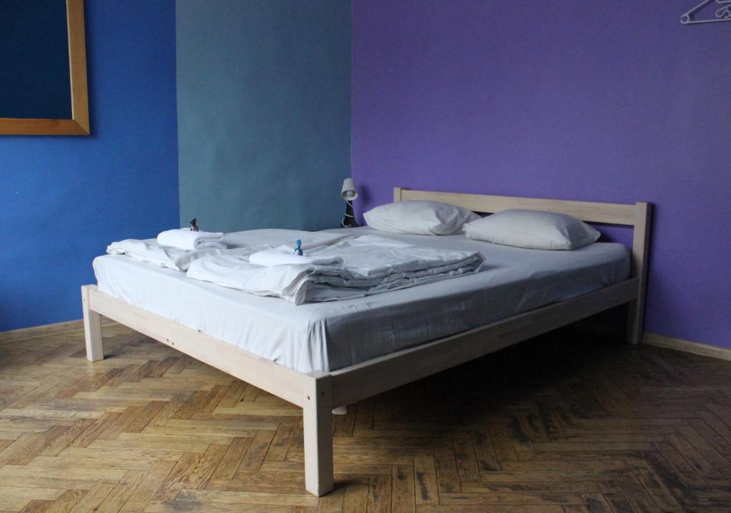 Postel nebo postele na pokoji v ubytování Viru Backpackers Hostel