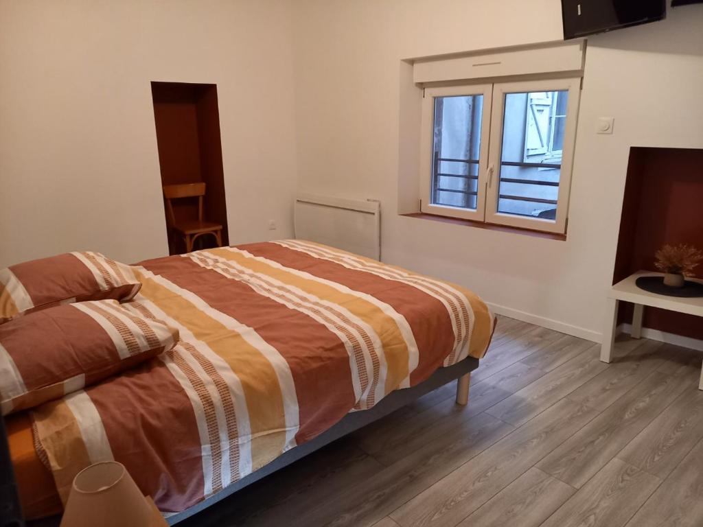 Postel nebo postele na pokoji v ubytování PàM DUROC