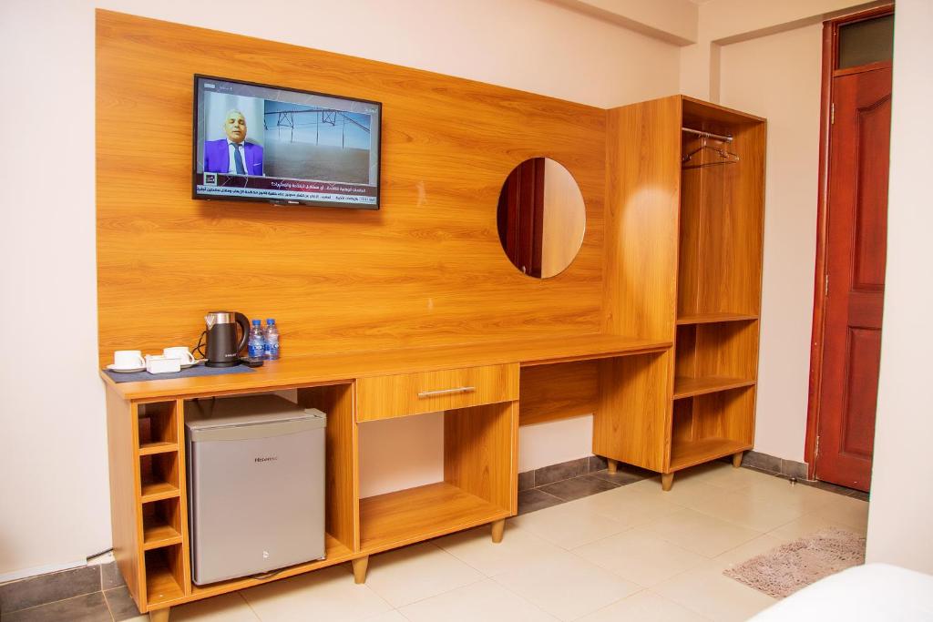 TV a/nebo společenská místnost v ubytování Blue Berries Hotel