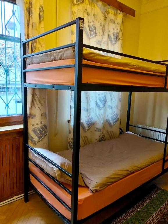 Letto o letti in una camera di Long Tree Hostel - Comfy Mattress