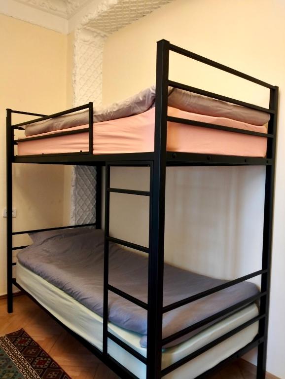 Letto o letti in una camera di Long Tree Hostel - Comfy Mattress