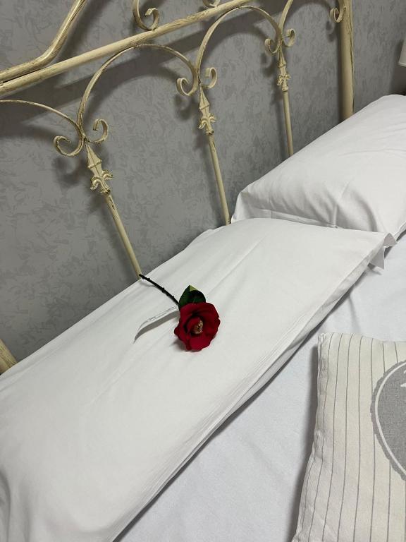 Postel nebo postele na pokoji v ubytování Agorà sulla via dei Templi