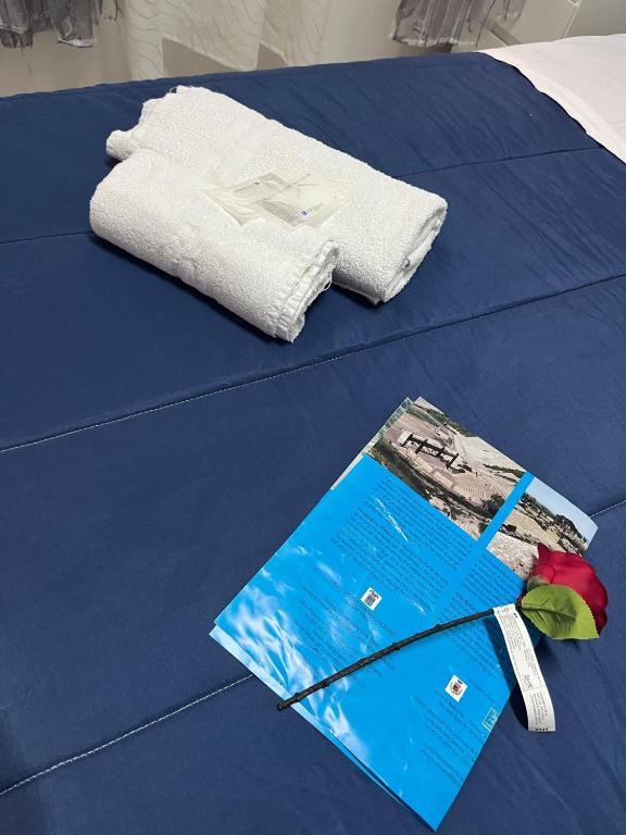Postel nebo postele na pokoji v ubytování Agorà sulla via dei Templi
