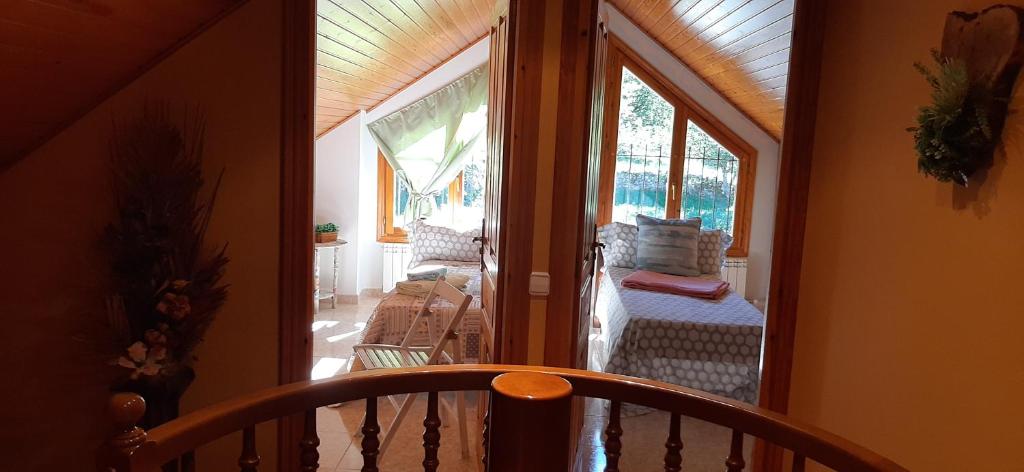 Postel nebo postele na pokoji v ubytování Ático-Duplex Basa la Mora