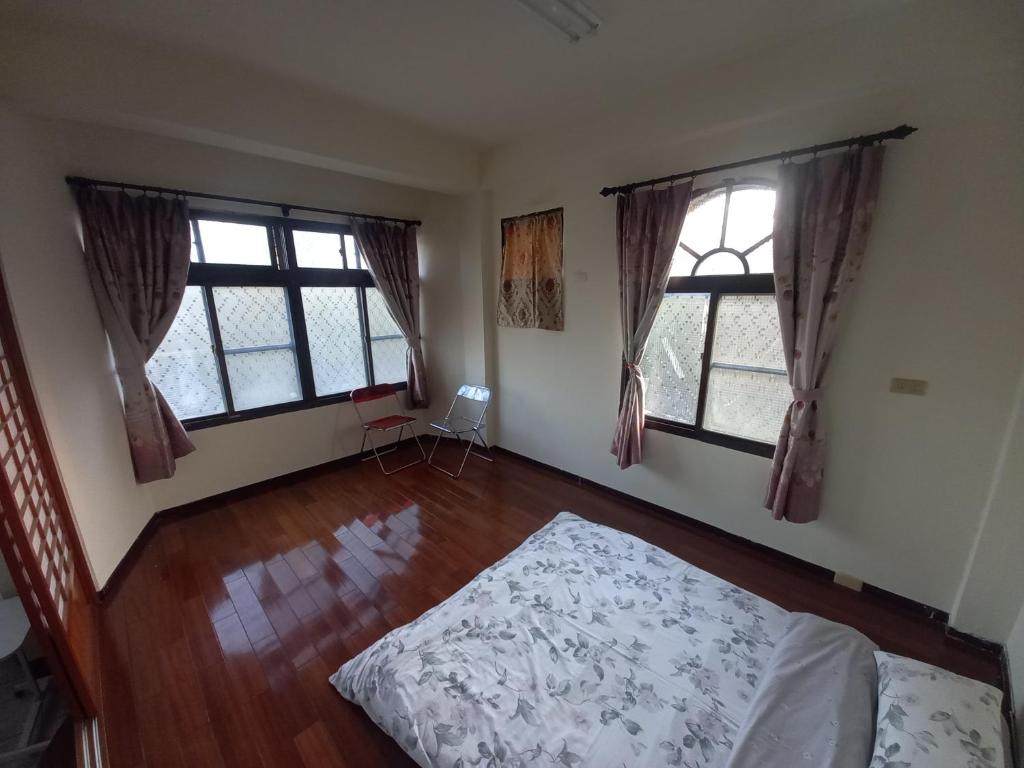 Postel nebo postele na pokoji v ubytování Huan Bei 88 Homestay