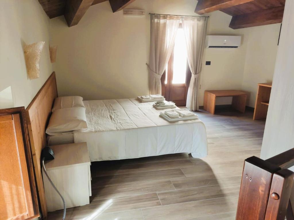 Postel nebo postele na pokoji v ubytování Il Borgo Ospitale - Albergo Diffuso
