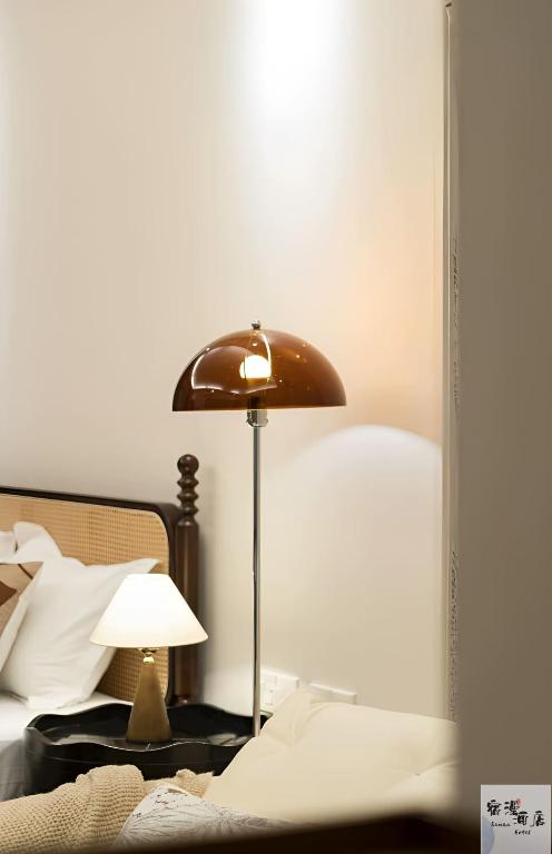 Posezení v ubytování Su Man Designer River View Hotel宿漫设计师江景酒店重庆洪崖洞店