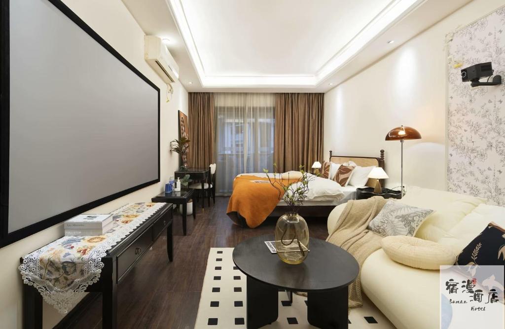 Posezení v ubytování Su Man Designer River View Hotel宿漫设计师江景酒店重庆洪崖洞店
