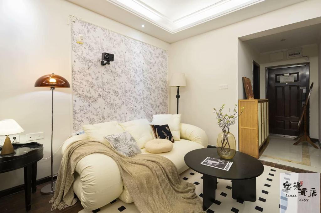 Posezení v ubytování Su Man Designer River View Hotel宿漫设计师江景酒店重庆洪崖洞店