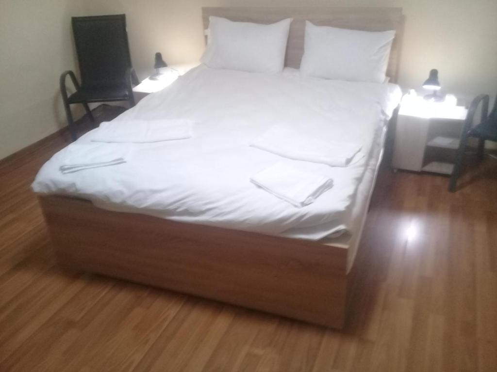 Postel nebo postele na pokoji v ubytování Villa Mukhrovani