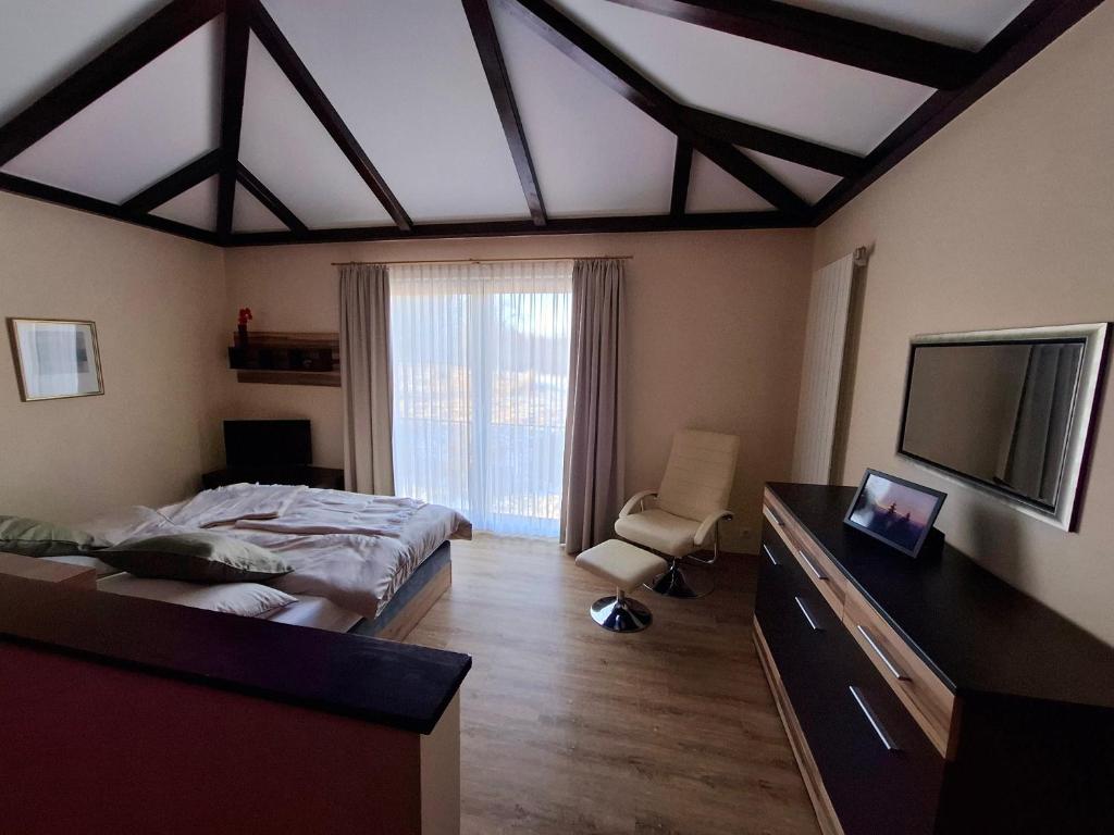 TV a/nebo společenská místnost v ubytování Haus Astenberg