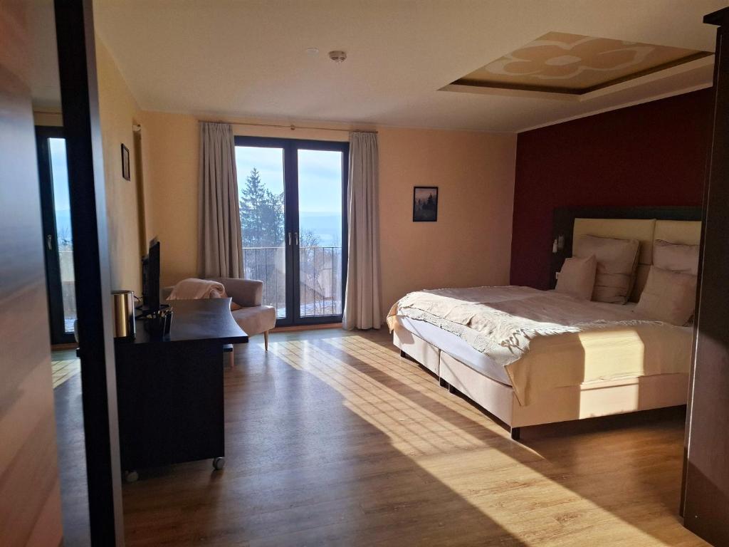 Postel nebo postele na pokoji v ubytování Haus Astenberg