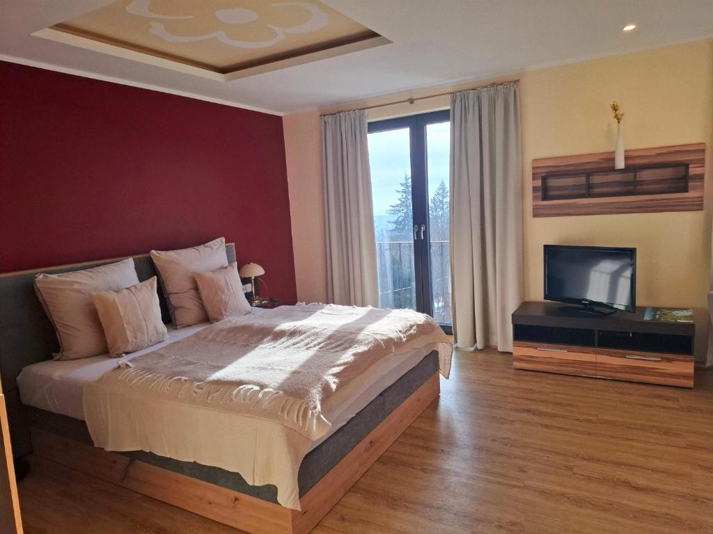 Postel nebo postele na pokoji v ubytování Haus Astenberg