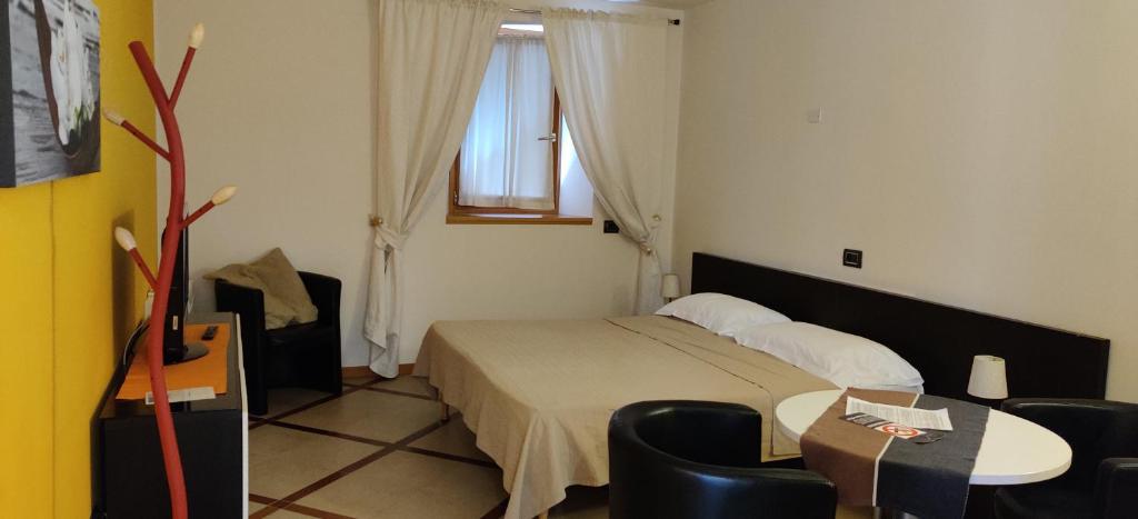 Postel nebo postele na pokoji v ubytování Marco Polo