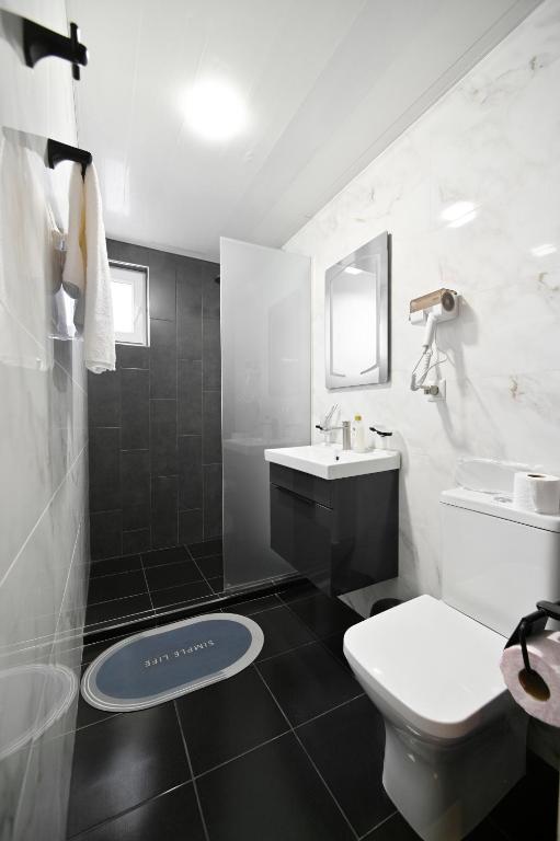 Koupelna v ubytování Mon Invite Hotel