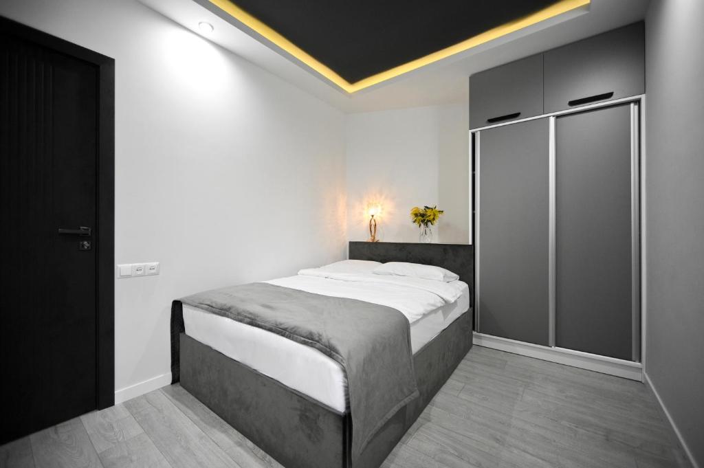 Postel nebo postele na pokoji v ubytování Mon Invite Hotel