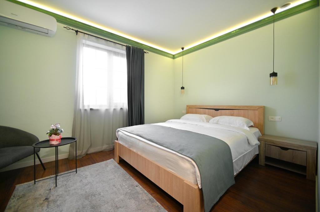Postel nebo postele na pokoji v ubytování Mon Invite Hotel