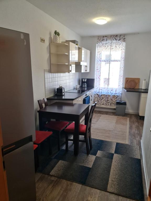 Kuchyň nebo kuchyňský kout v ubytování Ferienwohnung Dippoldiswalde