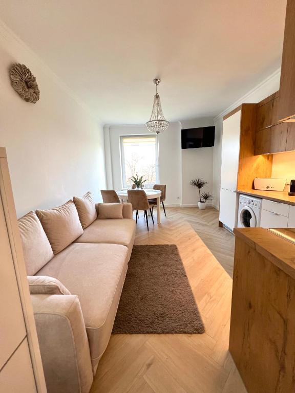 Telewizja i/lub zestaw kina domowego w obiekcie Apartamenty 19