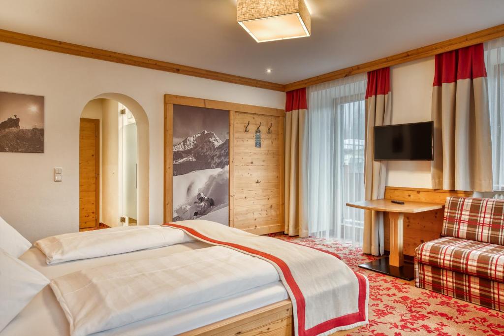 Postel nebo postele na pokoji v ubytování Hotel Alte Post