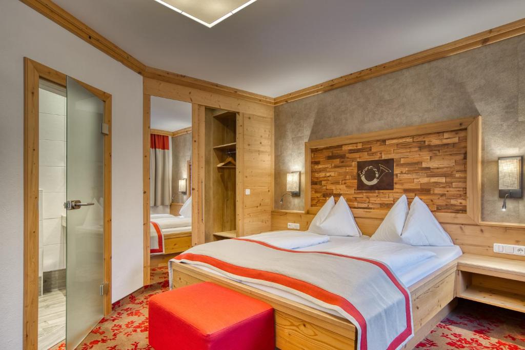 Postel nebo postele na pokoji v ubytování Hotel Alte Post