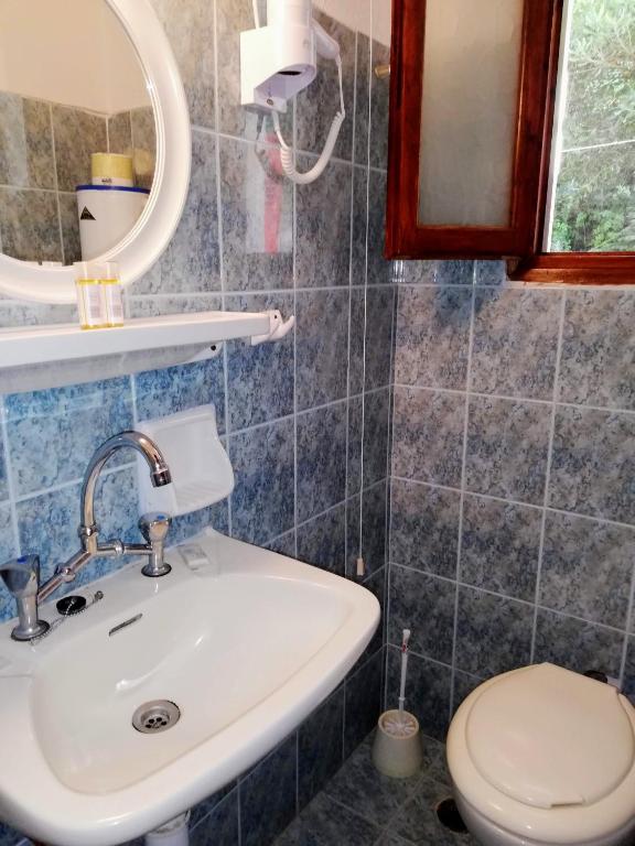 Koupelna v ubytování Hotel Erato