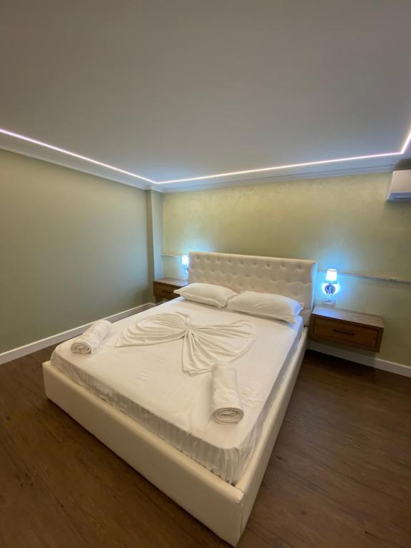 Postel nebo postele na pokoji v ubytování Bliss Boutique Hotel
