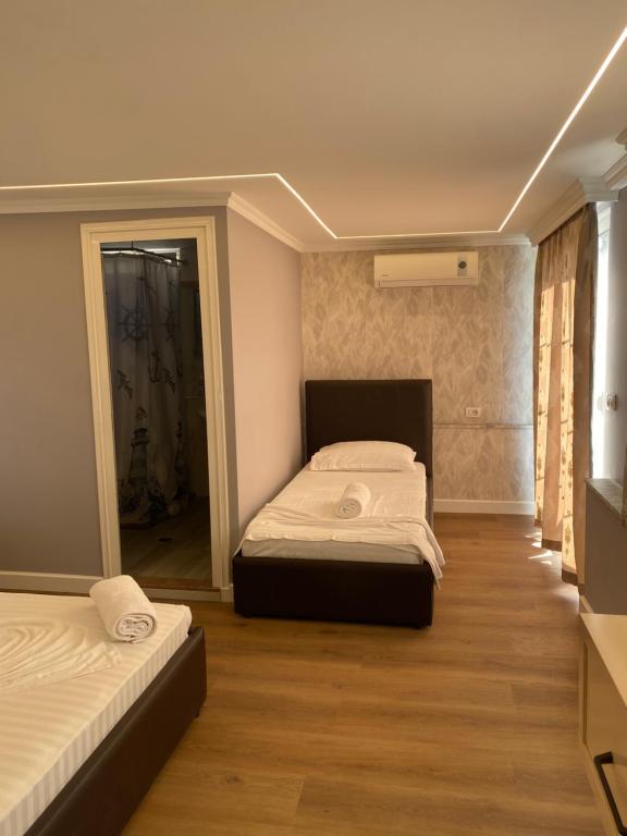 Postel nebo postele na pokoji v ubytování Bliss Boutique Hotel