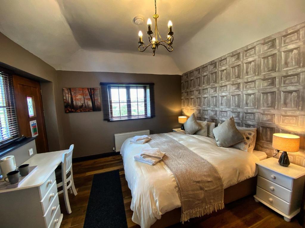 Postel nebo postele na pokoji v ubytování The Mary Tavy Inn