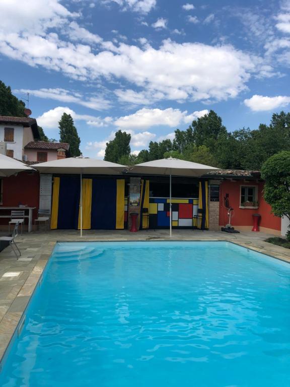 Bazén v ubytování B&B Villa la Canonica con piscina privata a Padernello nebo v jeho okolí