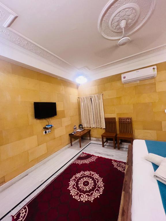 TV a/nebo společenská místnost v ubytování Garh Villa Jaisalmer