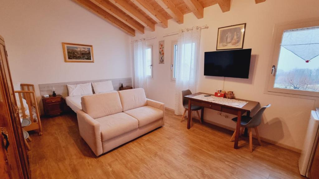 TV a/nebo společenská místnost v ubytování Casa Vilma