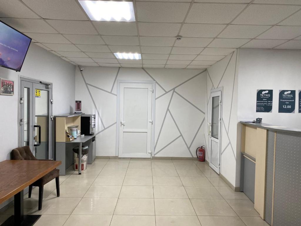 TV a/nebo společenská místnost v ubytování Hotel TETRIS Voznesensk