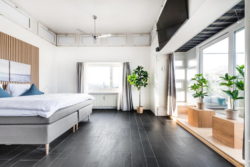 Postel nebo postele na pokoji v ubytování SOHO Penthouse