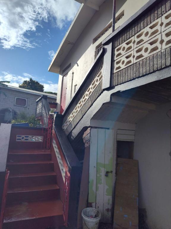 a set of stairs leading up to a building at BBV Properties in Belmont