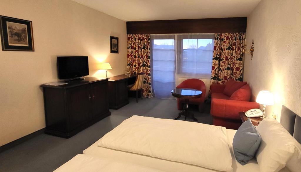Postel nebo postele na pokoji v ubytování Hotel-Restaurant Batzenhäusl