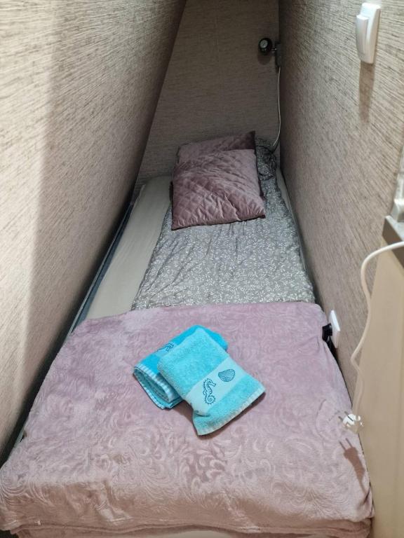 Tempat tidur dalam kamar di Apartman-Diva-Vukovic