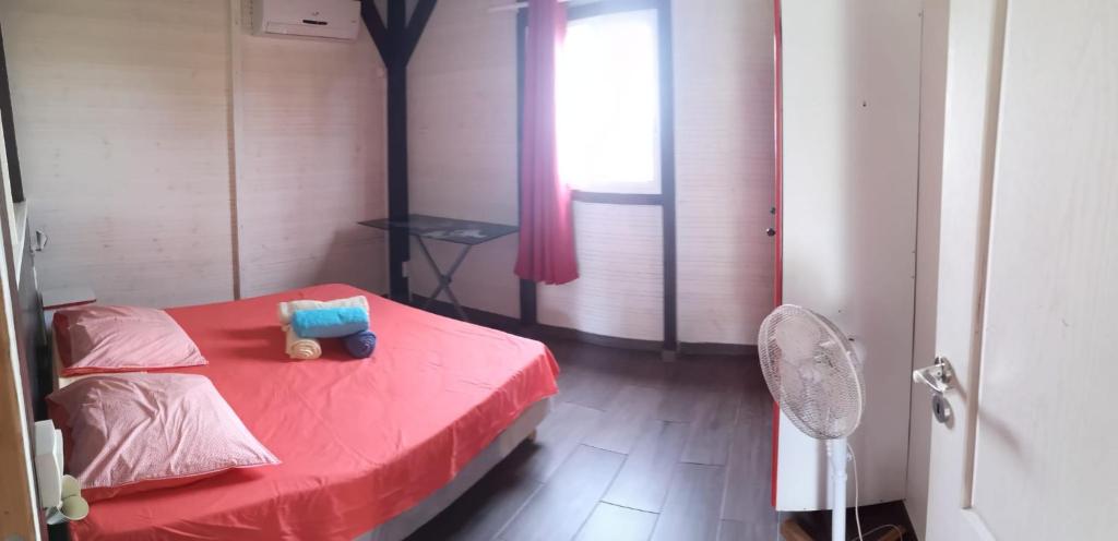Postel nebo postele na pokoji v ubytování Bungalow ROUGE