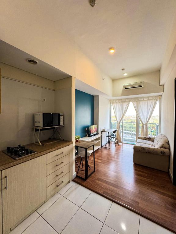 Kuchyň nebo kuchyňský kout v ubytování Apt Casa De Parco 1BR With WiFi, Pool & Netflix by Damaresa