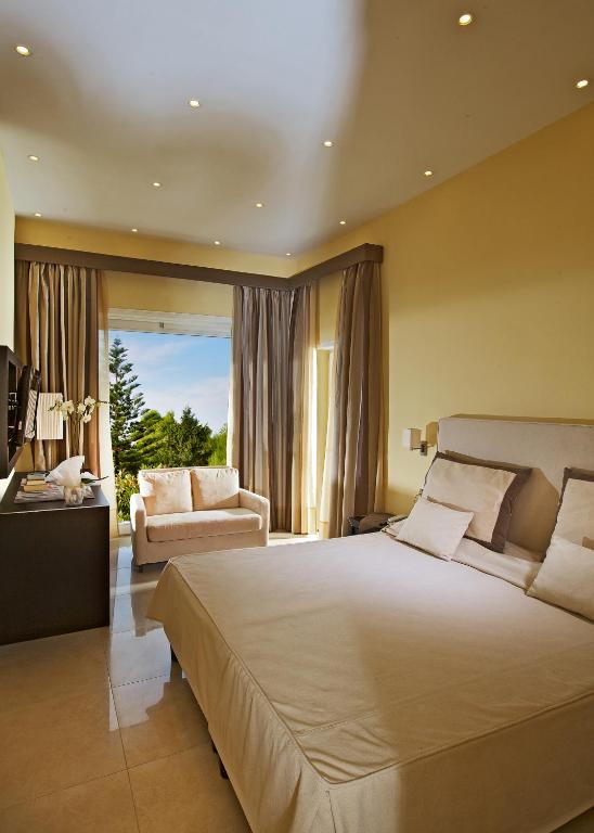 Postel nebo postele na pokoji v ubytování Hotel San Michele