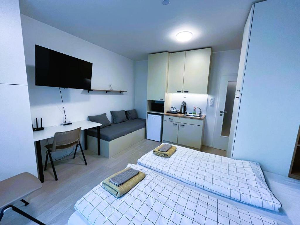 Kuchyň nebo kuchyňský kout v ubytování Bella Apartments Brno
