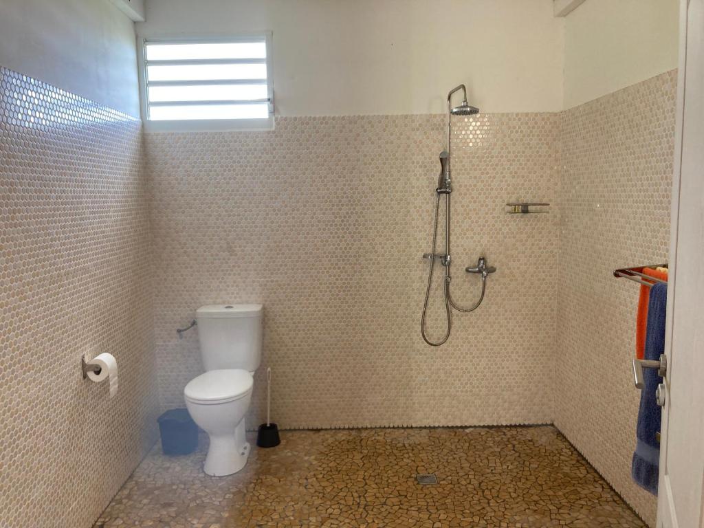 Koupelna v ubytování Bungalow ROUGE
