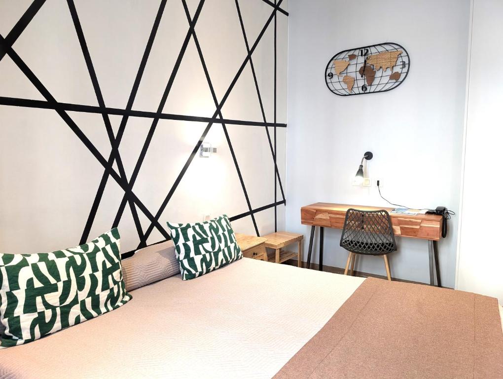 Postel nebo postele na pokoji v ubytování H33 Hôtel
