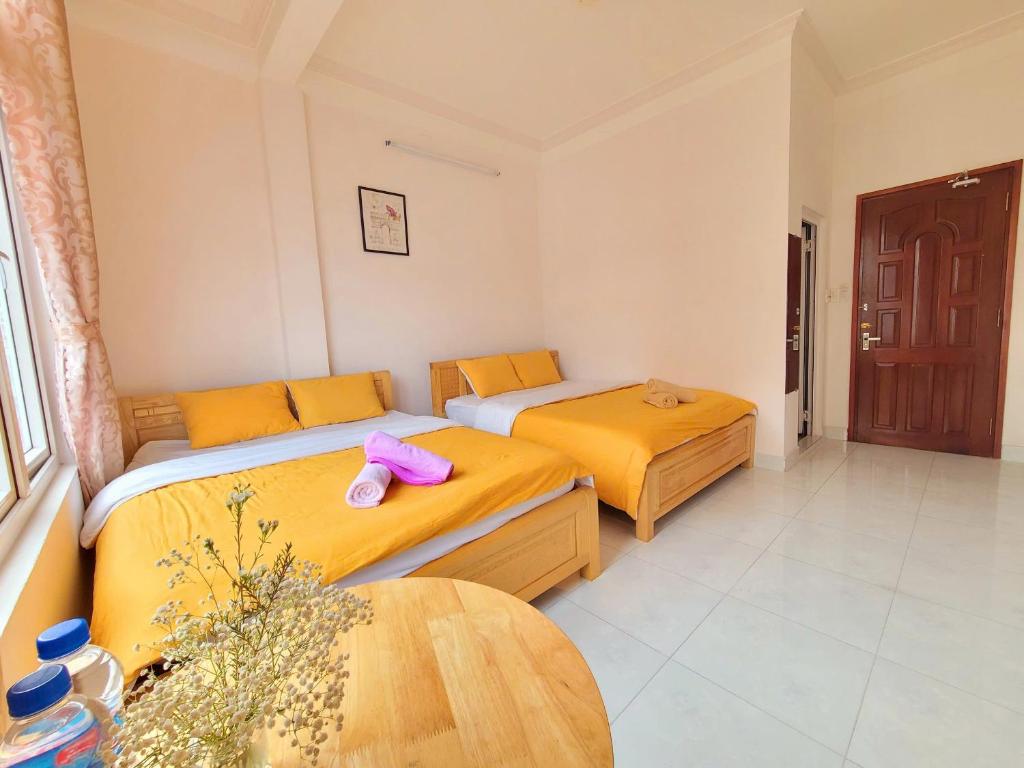Giường trong phòng chung tại Dalat Tiny Tigers Hostel