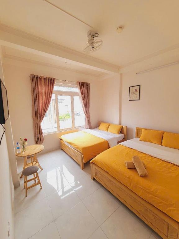Giường trong phòng chung tại Dalat Tiny Tigers Hostel