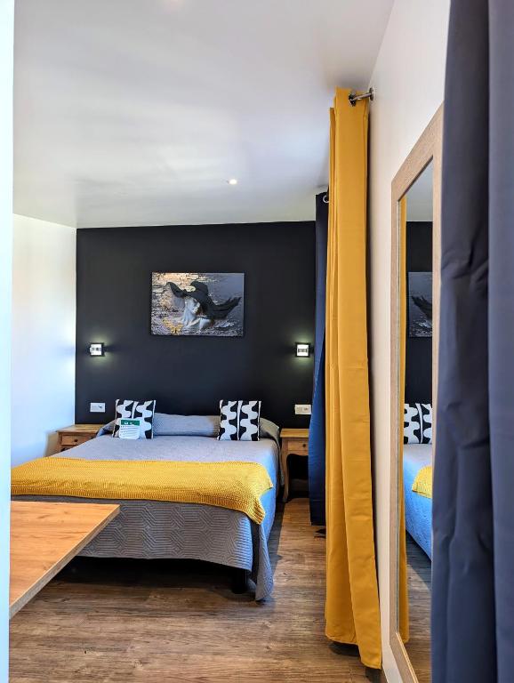 Postel nebo postele na pokoji v ubytování H33 Hôtel