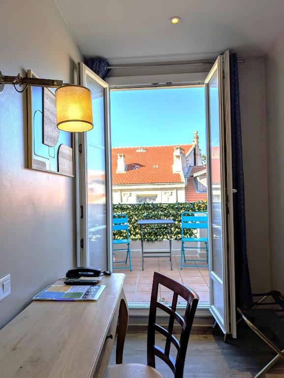Balkón nebo terasa v ubytování H33 Hôtel