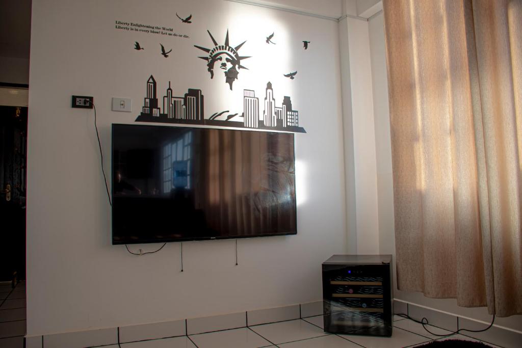TV a/nebo společenská místnost v ubytování Cosmos Uyuni