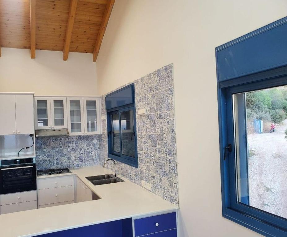 Kuchyň nebo kuchyňský kout v ubytování Ohn-Bar Guesthouse