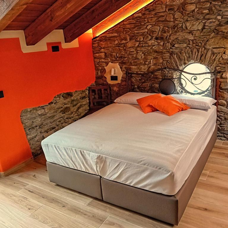 Postel nebo postele na pokoji v ubytování Le Foyer de Grand-mère
